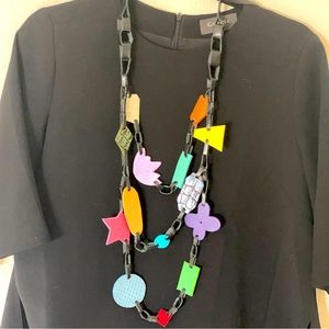 ONE OF A KIND POSH SALE! PR Designer necklace LEATHER.  diseñadora Arlene Díaz